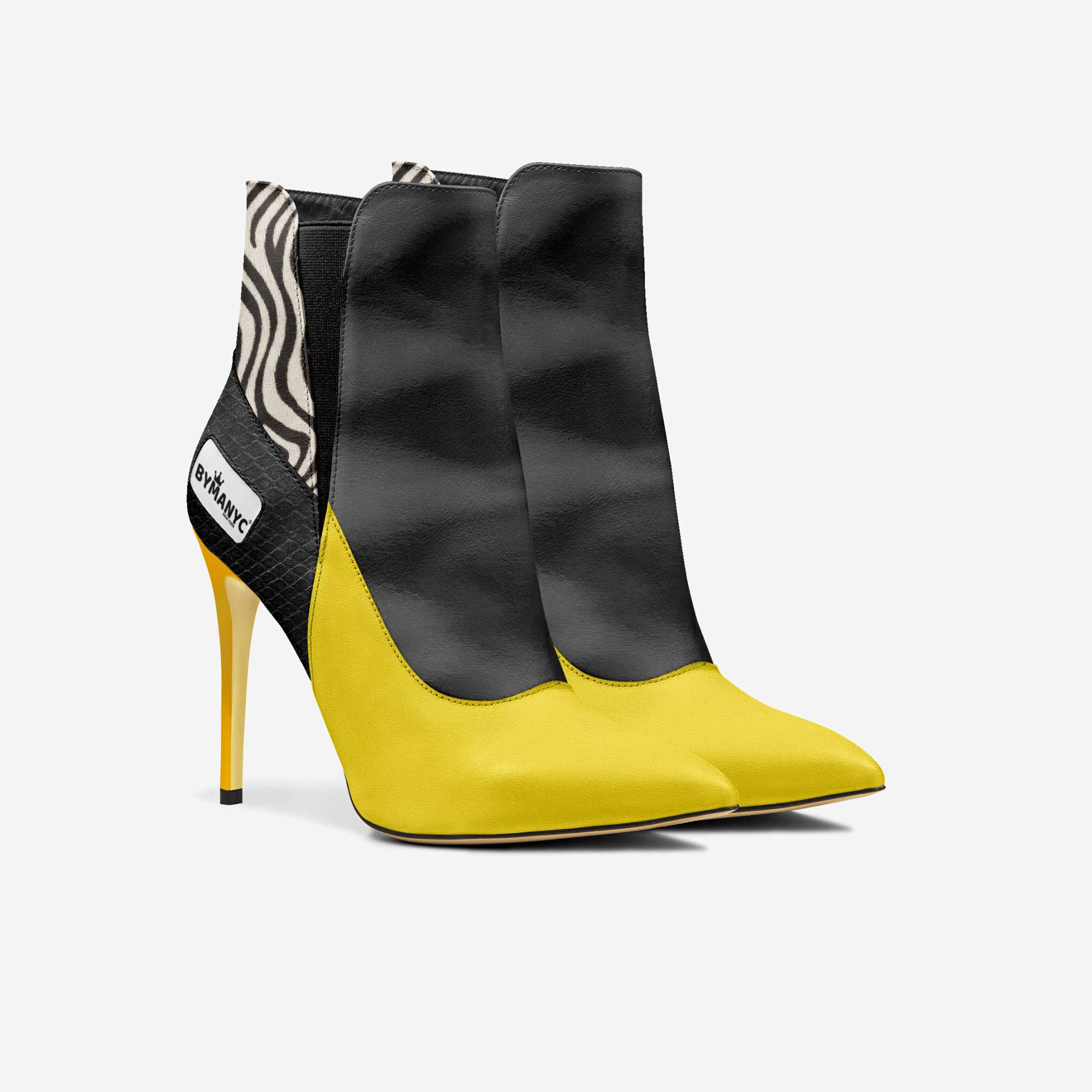 Black and yellow high-heeled ankle boots on a white background