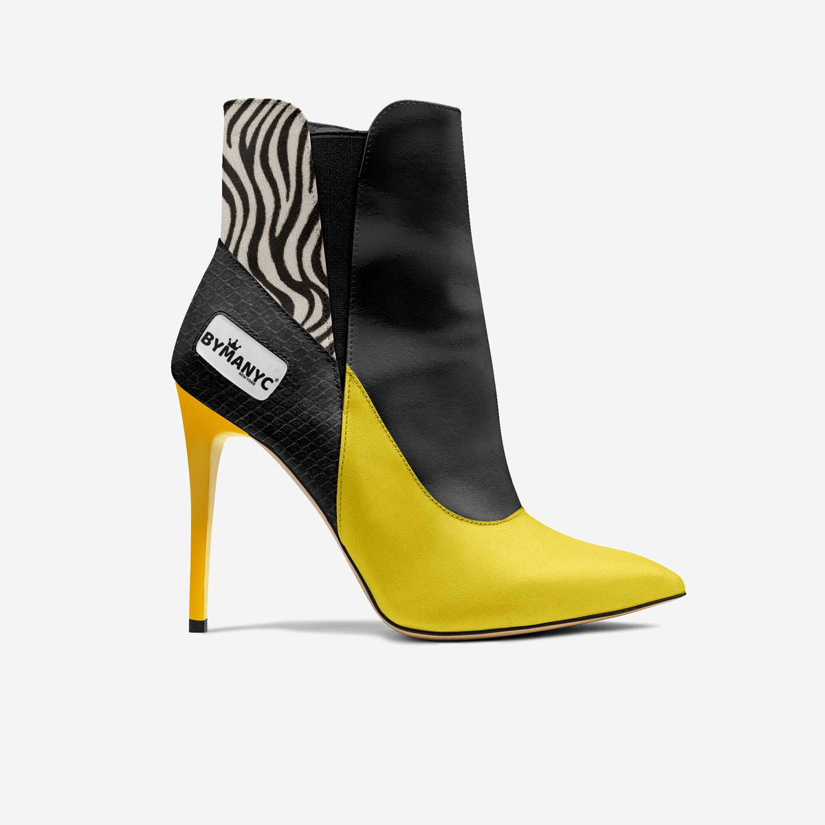 Black and yellow high-heeled ankle boot with zebra pattern on a white background