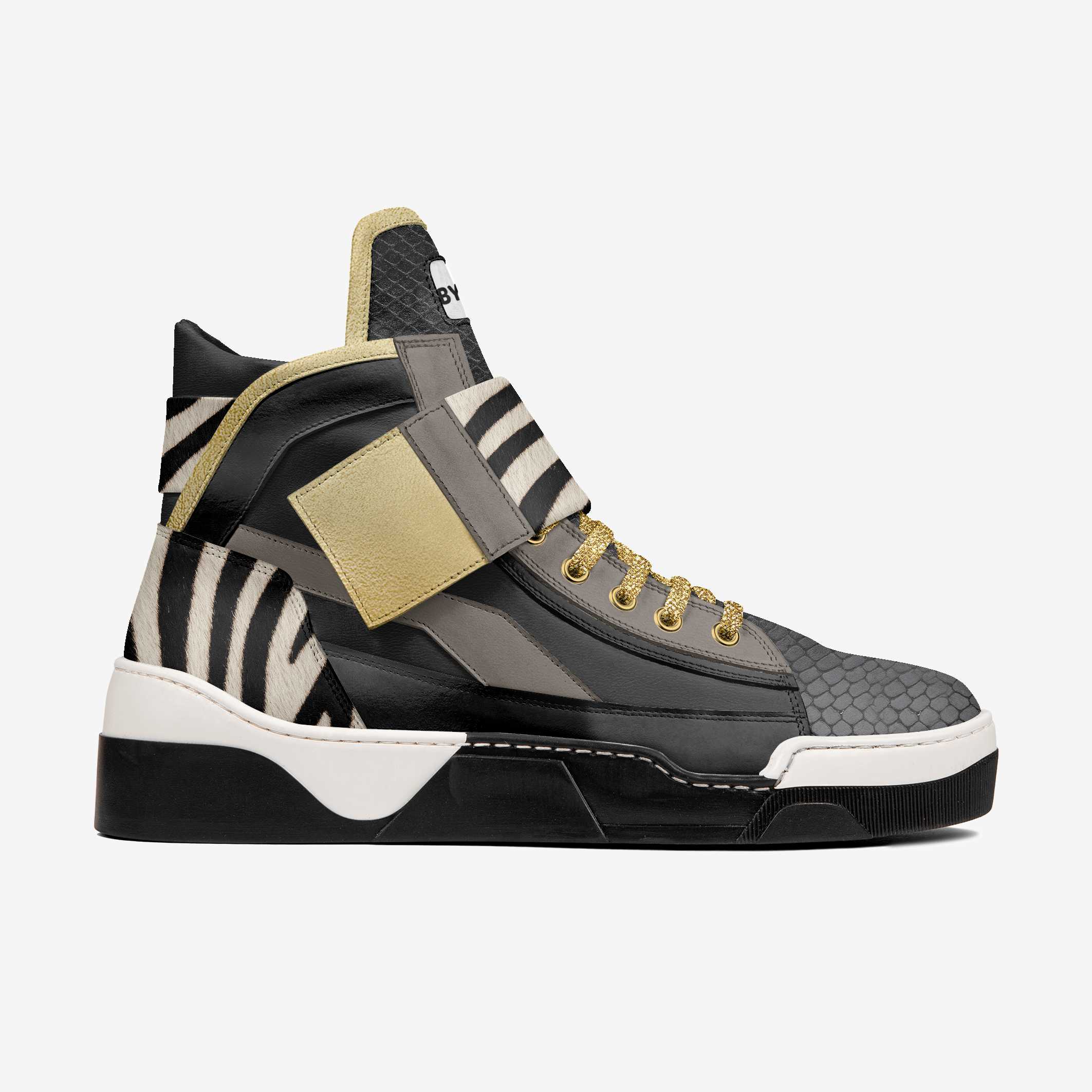 Black and white sneaker with gold accents on a white background