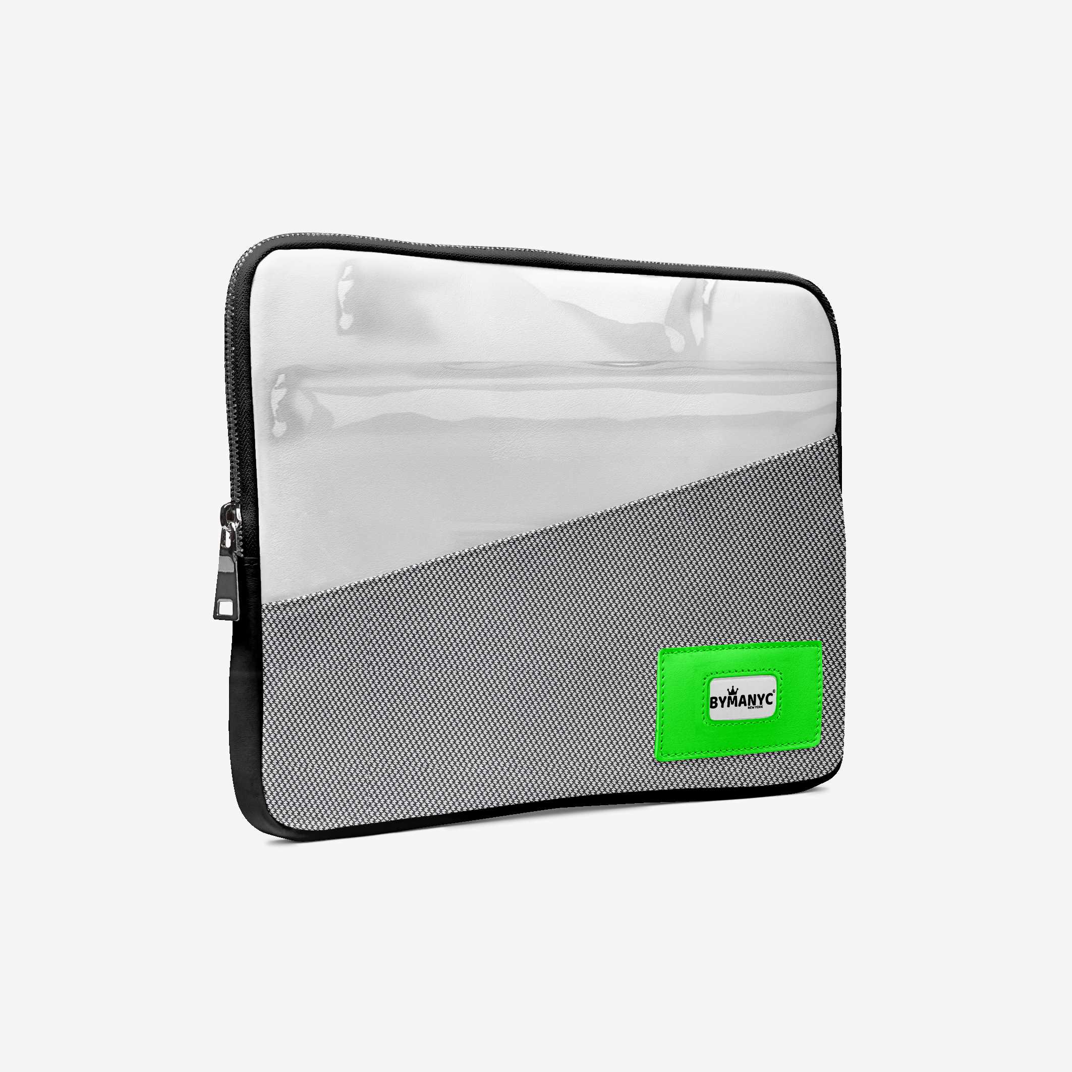 Gray laptop sleeve with a green label on a white background