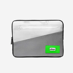 Gray and white laptop sleeve with a green label on a light gray background