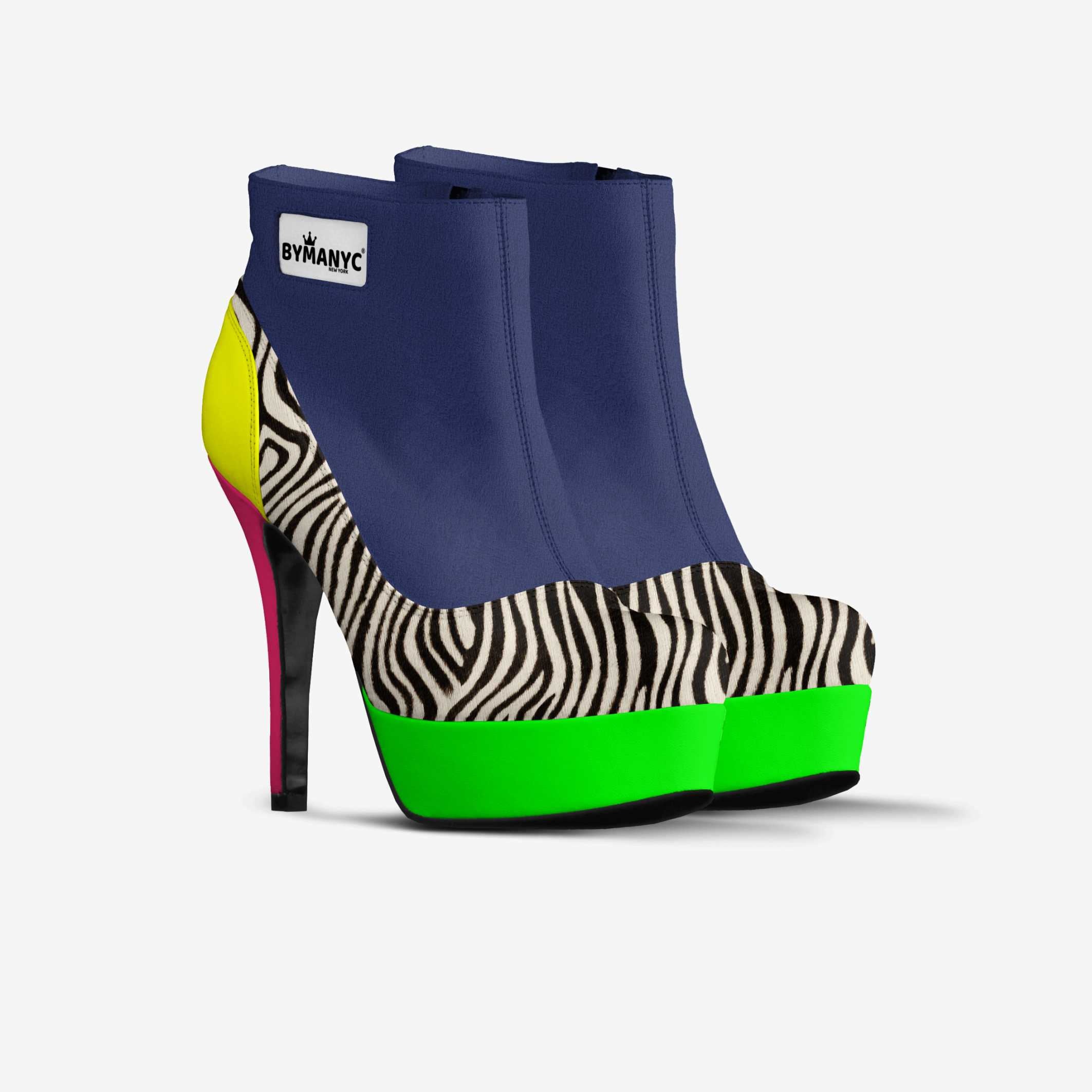 Colorful high-heeled shoe with zebra pattern and green sole on a white background