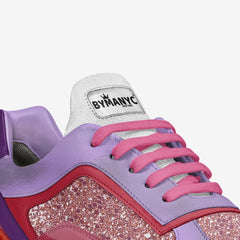 Colorful sneaker with pink laces and glittery sole on a white background