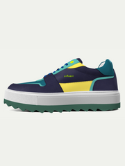 Multicolored sneaker with a white sole on a light gray background