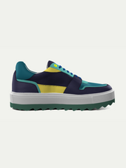 Multicolored sneaker with a white sole on a light gray background