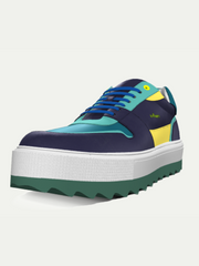 Multicolored sneaker with a white sole on a light gray background