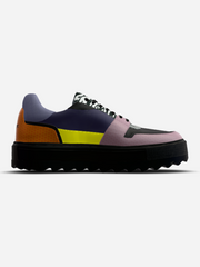 Multicolored sneaker with a platform sole on a white background