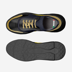 Black and gold sneaker with sole view on a light gray background