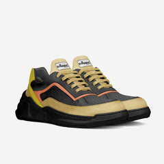 Black and beige sneaker with orange accents on a white background