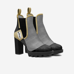 Black and beige ankle boots with mesh panels on a white background