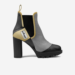 Black and gold ankle boot with platform sole on a white background