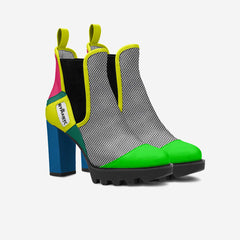 Colorful Chelsea boots with a brand label on a white background