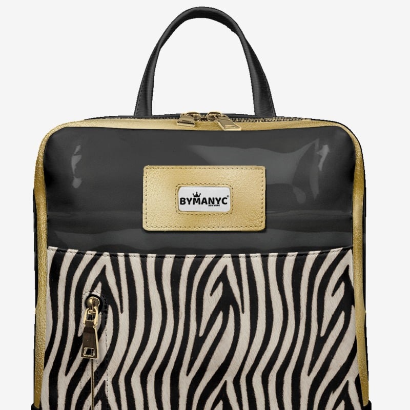 Backpack with zebra pattern and By Many brand label on a light gray background