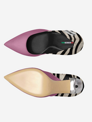 Two shoes with pink and zebra patterned soles on a white background
