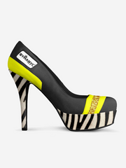 High-heeled shoe with zebra pattern and yellow accents on a white background