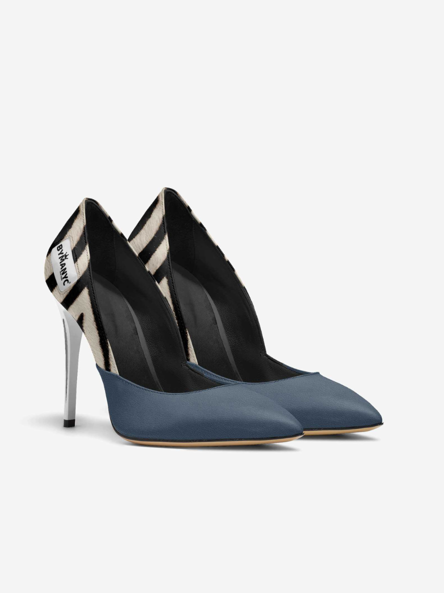 Pair of high-heeled shoes with black and blue design on a white background