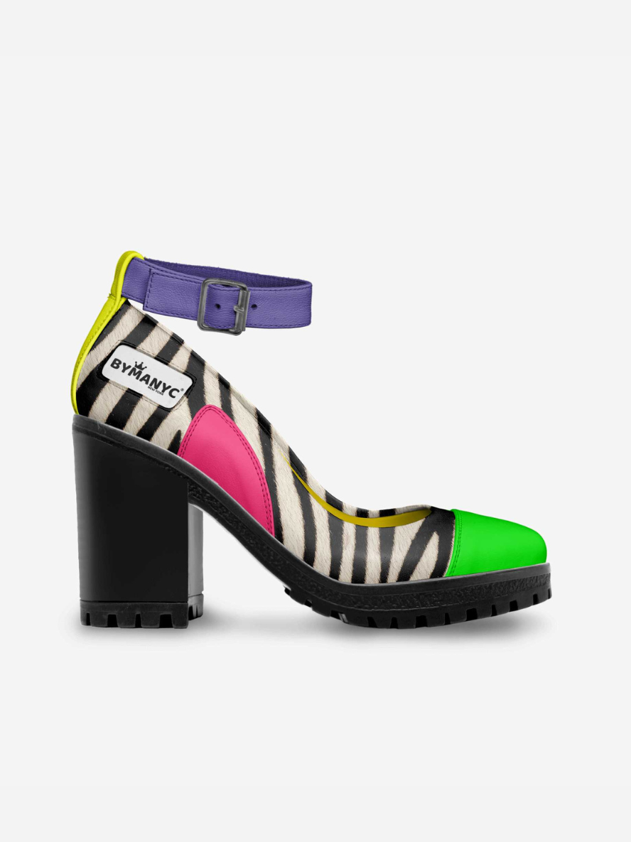 Multicolored shoe with zebra pattern and colorful sole on a white background