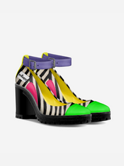 Colorful high-heeled shoes with zebra pattern and multicolor sole on a white background