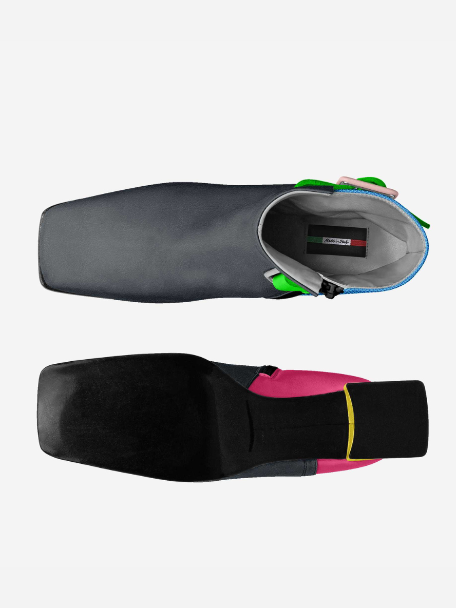 Two pairs of colorful ski boots on a white background