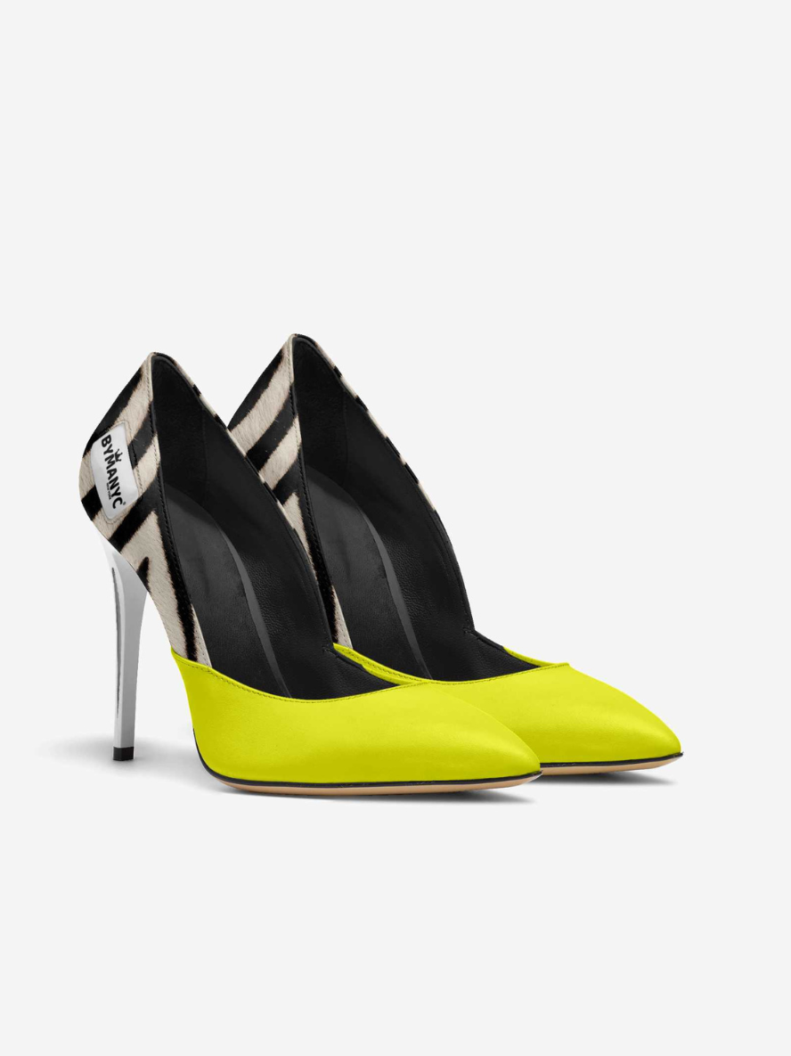 Black and neon yellow high-heeled shoes on a white background
