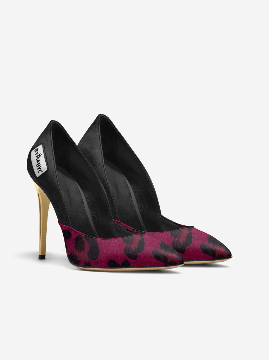 Black high-heeled shoes with pink leopard print pattern on a white background
