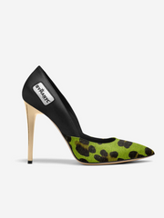 Green and black spotted high-heeled shoe with a visible brand label on a white background