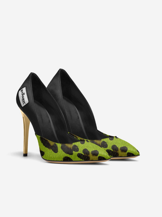 Green high-heeled shoes with black leopard print pattern on a white background