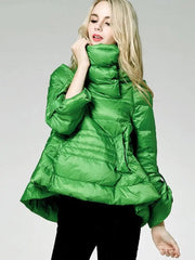 Person wearing a green puffer jacket on a plain background
