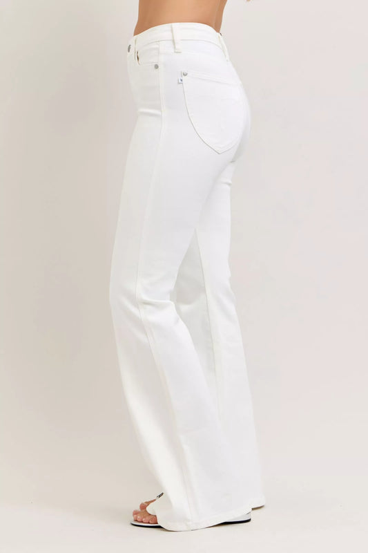 White jeans on a plain background