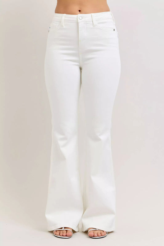 White jeans on a plain background