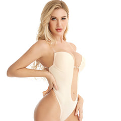 Woman wearing a beige strapless bodysuit on a white background