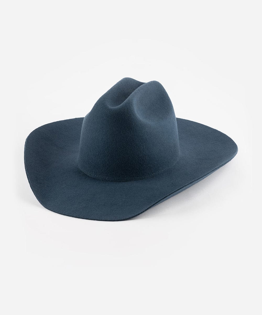 Navy blue cowboy hat on a light gray background
