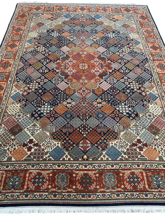 Hand-Knotted Indo-Joshegan Wool Rug – 12'2" x 9'1" – Geometric Medallion Design, Rich Warm Palette Rugistan