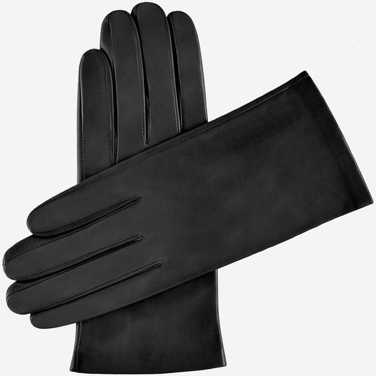 Pair of black leather gloves on a white background