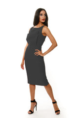 Woman wearing a gray sleeveless dress on a white background