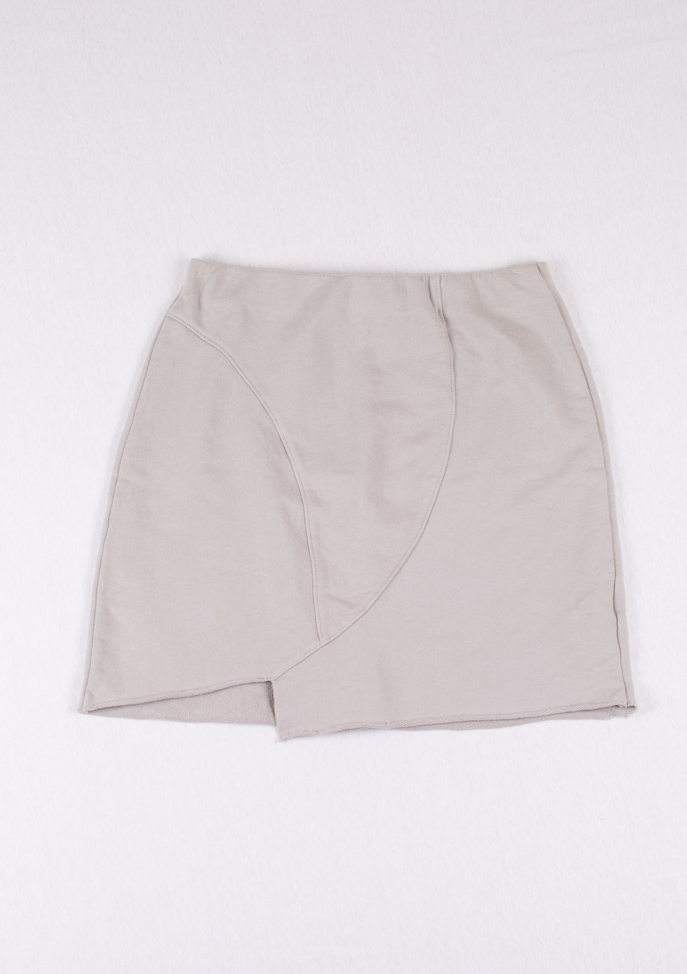 Beige wrap skirt on a white background