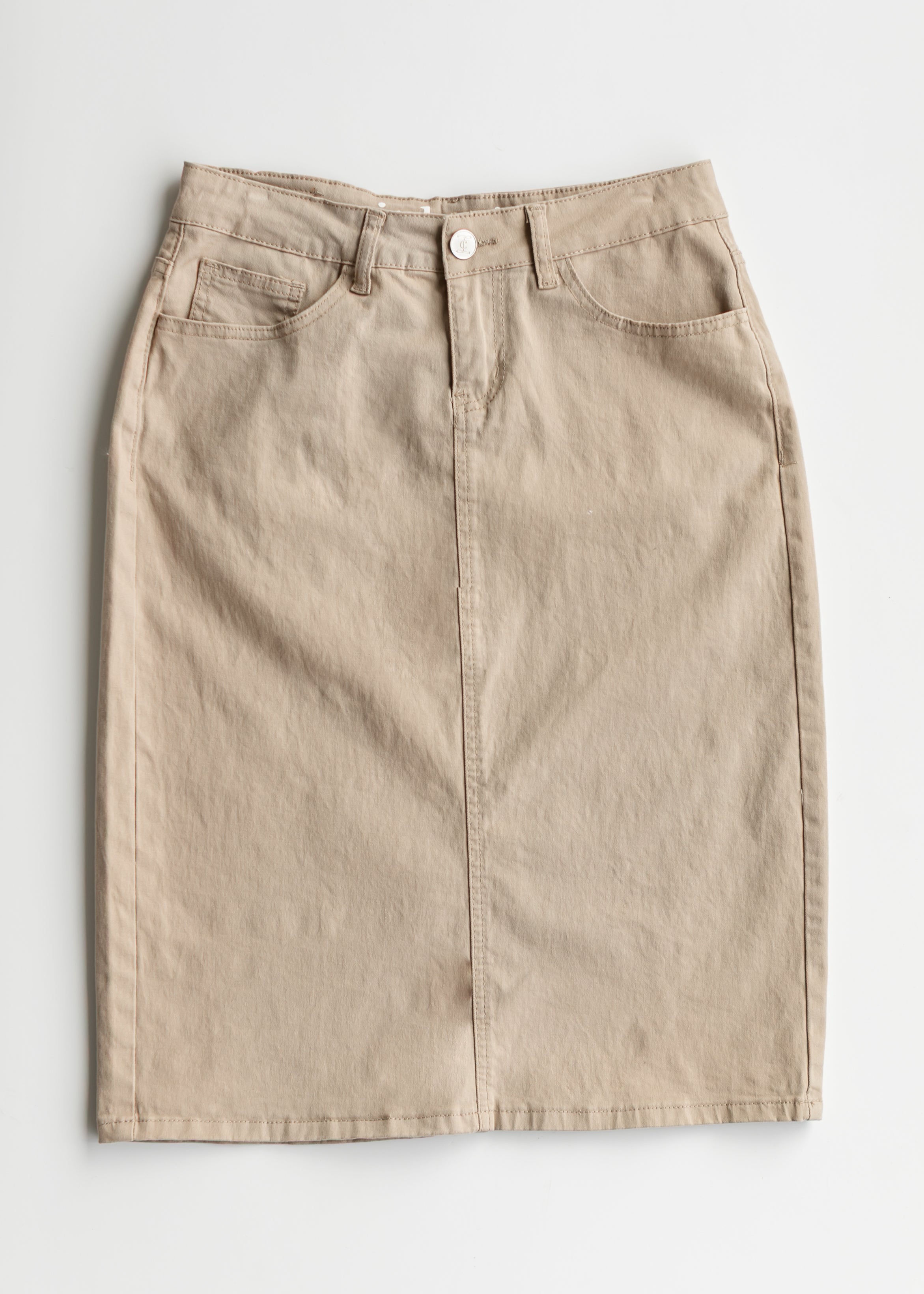 Beige denim skirt on a white background