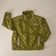 Green checkered jacket with 'RAD' logo on a beige background