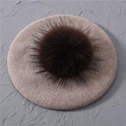 Knitted wool beret with a pom-pom made of natural raccoon fur - Family Shopolf