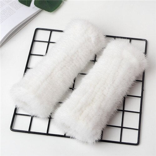 Women's winter knitted mittens with open toes made of natural mink fur